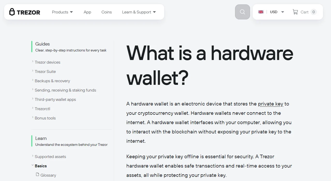 Trezor-un "What is a hardware wallet?" bilik bazası səhifəsi: aparat pul kisəsinin şəxsi açarı saxlayan elektron cihaz olduğu və açarı internetə açmadan blokçeynlə işləməyə imkan verdiyi izah edilir